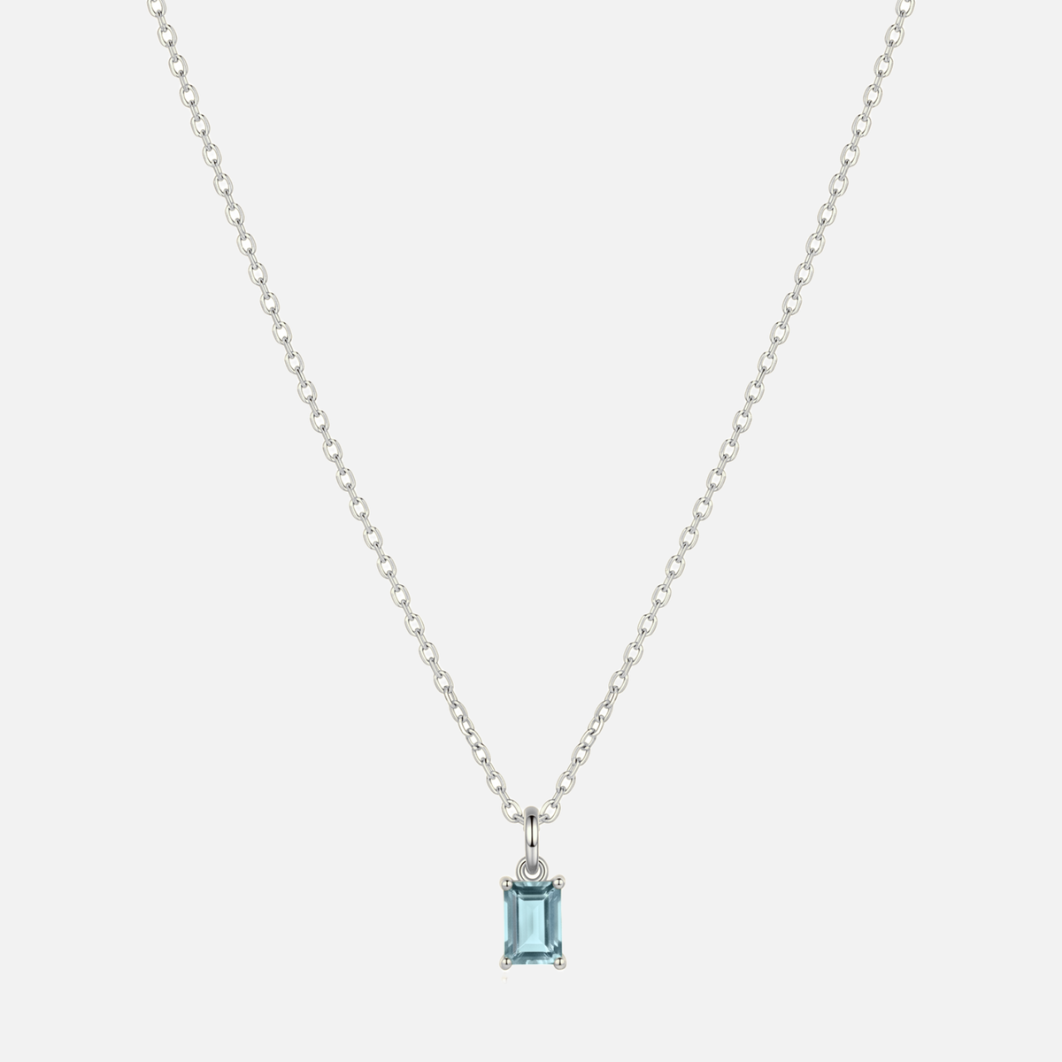 Éclat baguette birthstone necklace in silver with a March aquamarine-coloured birthstone