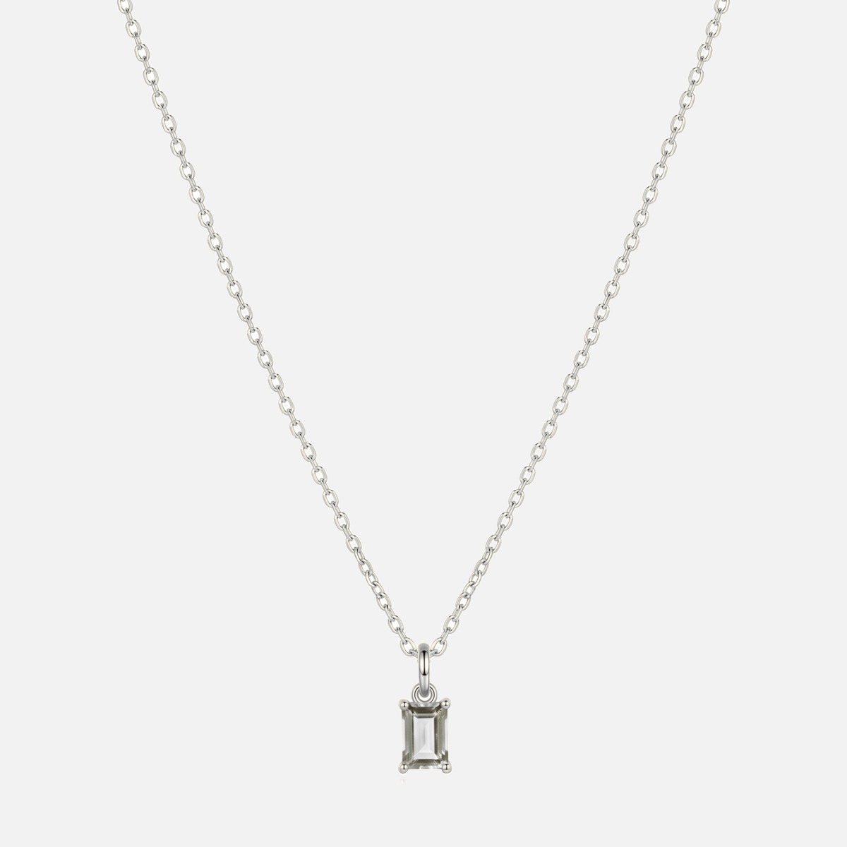 Éclat baguette birthstone necklace in silver with an April clear moissanite-style birthstone