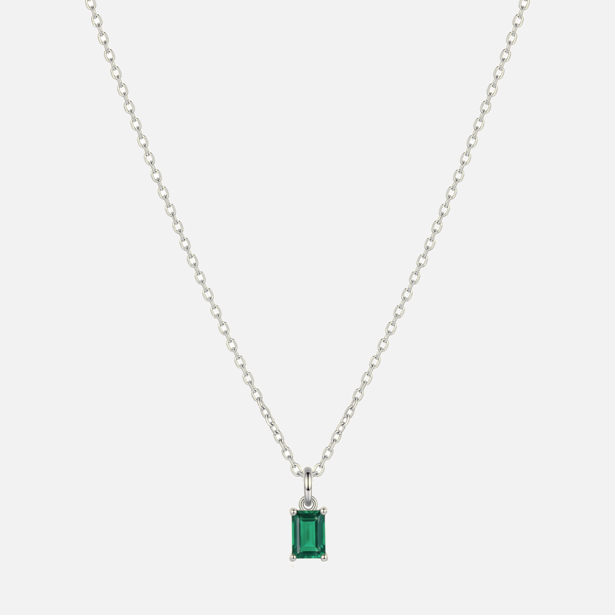 Éclat baguette birthstone necklace in silver with a May emerald-coloured birthstone