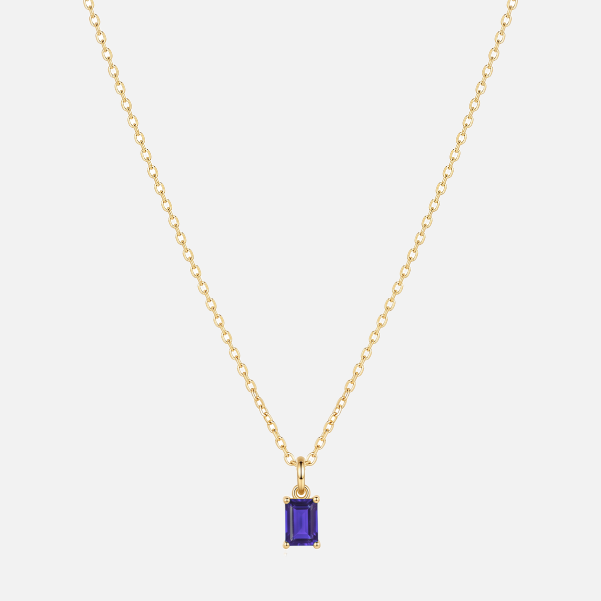 Éclat baguette birthstone necklace in gold with a June alexandrite-coloured birthstone
