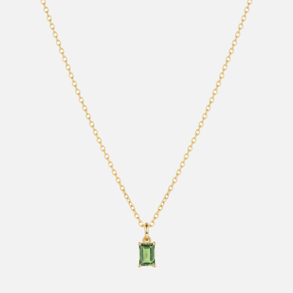 Éclat baguette birthstone necklace in gold with an August peridot-coloured birthstone