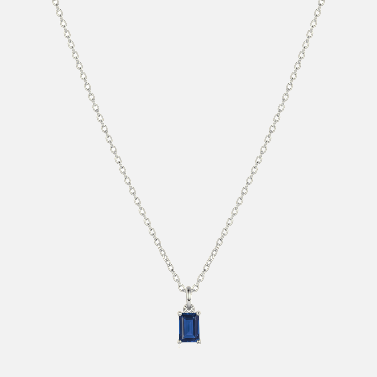 Éclat baguette birthstone necklace in silver with a September sapphire-coloured birthstone