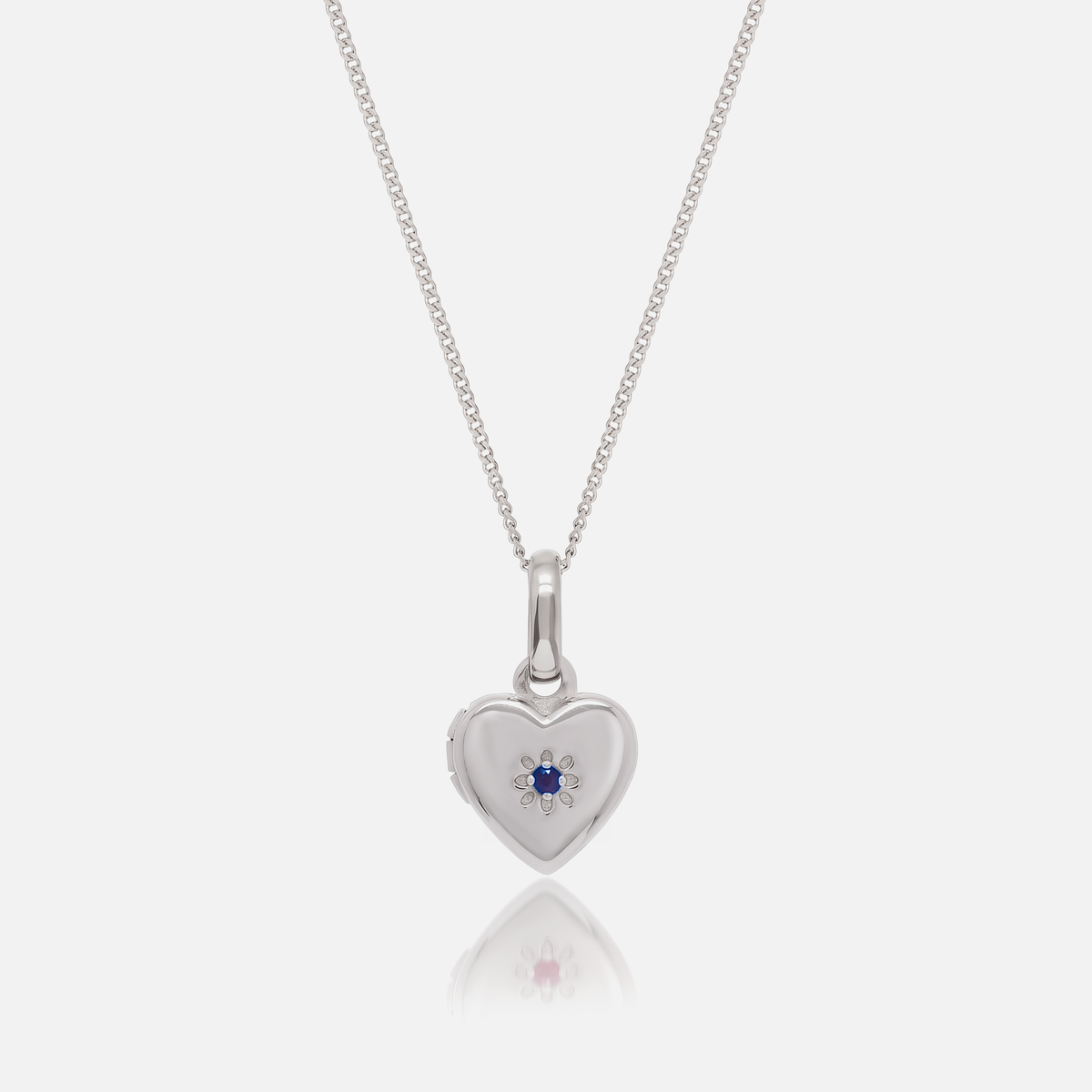 Close-up of the Silver Birthstone Heart Locket with September Sapphire birthstone – Jewelled Me