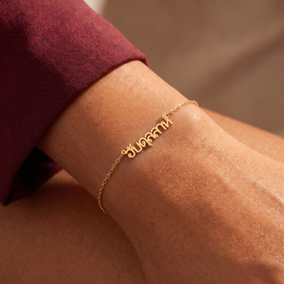 Custom Language Bracelet worn on the wrist, personalised name in another language