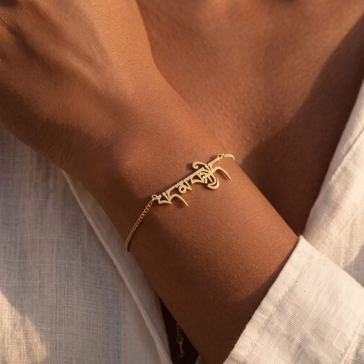 Custom Language Bracelet worn on the wrist, personalised name in another language