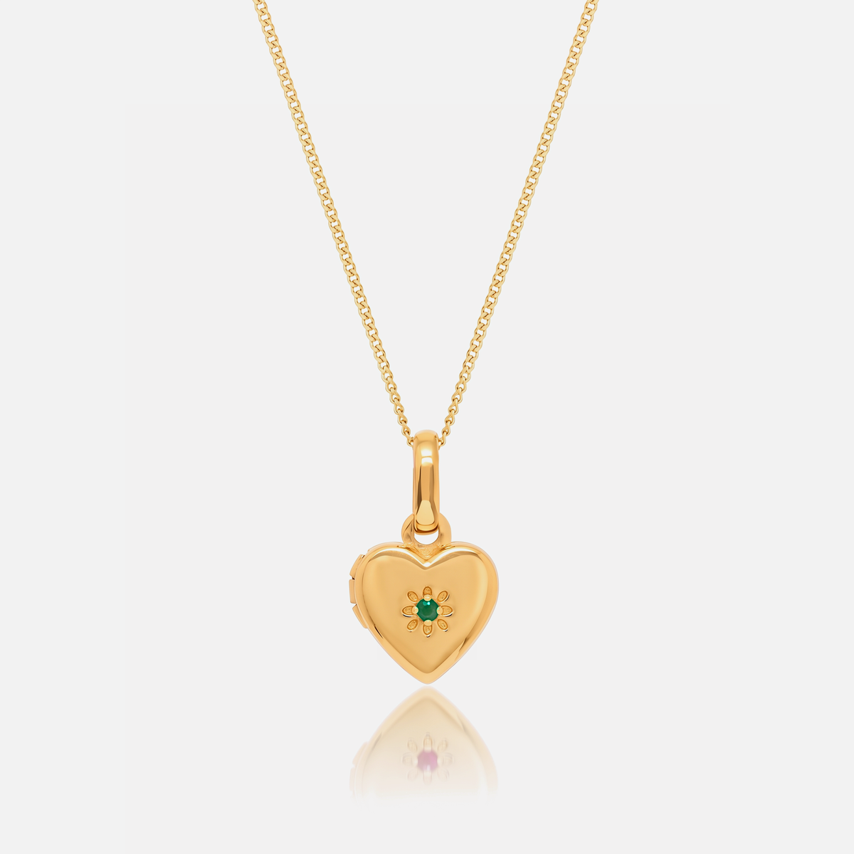 Close-up of the Gold Birthstone Heart Locket with May Emerald birthstone – Jewelled Me