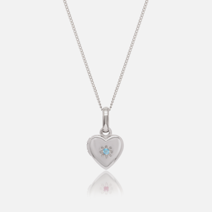Close-up of the Silver Birthstone Heart Locket with March Aquamarine birthstone – Jewelled Me