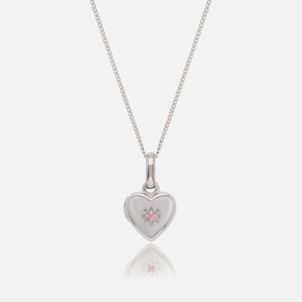 Close-up of the Silver Birthstone Heart Locket with October Rose Quartz birthstone – Jewelled Me