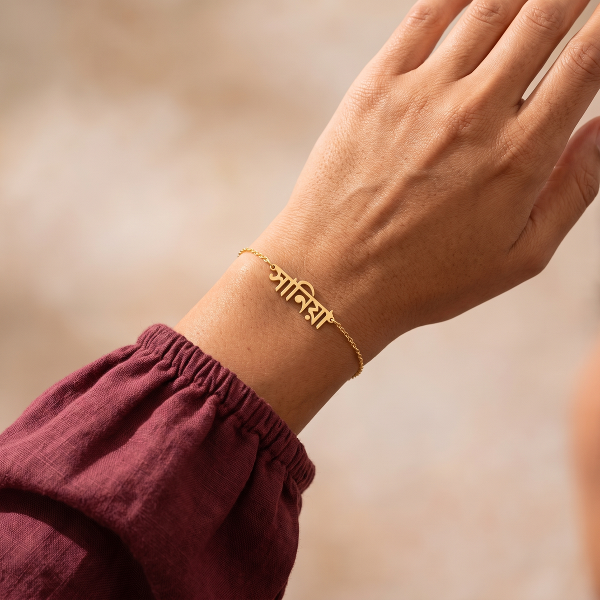 Custom Language Bracelet worn on the wrist, personalised name in another language