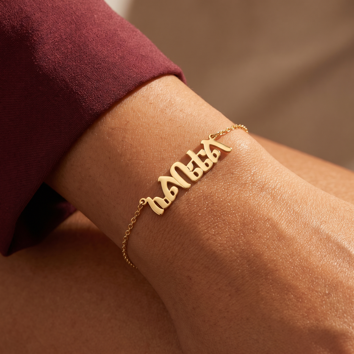 Custom Language Bracelet worn on the wrist, personalised name in another language