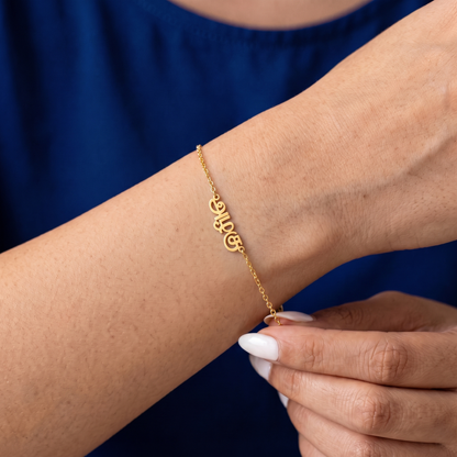 Custom Language Bracelet worn on the wrist, personalised name in another language