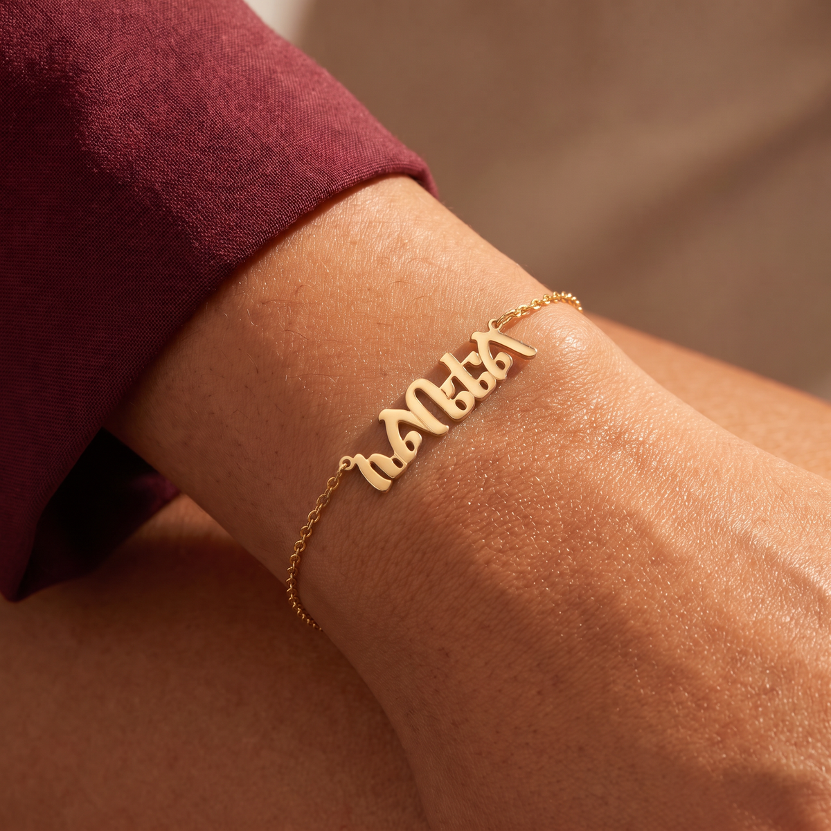 Custom Language Bracelet worn on the wrist, personalised name in another language