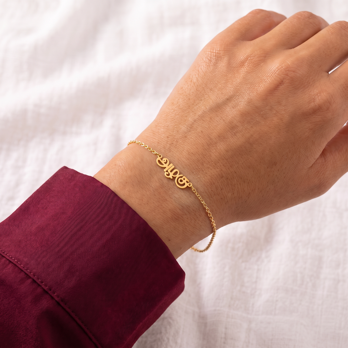 Custom Language Bracelet worn on the wrist, personalised name in another language