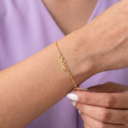 Custom Language Bracelet worn on the wrist, personalised name in another language