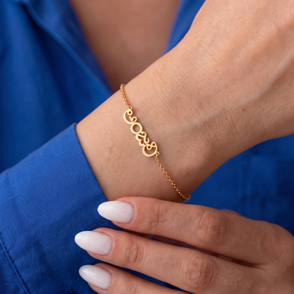 Custom Language Bracelet worn on the wrist, personalised name in another language